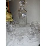 A mid 20th century cut glass decanter with six glasses. COLLECT ONLY.