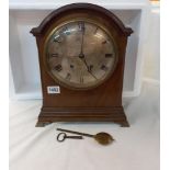 A 19th century bracket clock with silvered dial