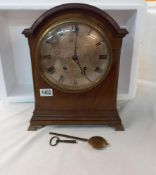 A 19th century bracket clock with silvered dial