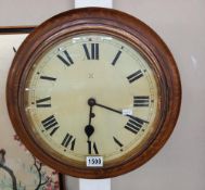 A Round spring wound wall clock