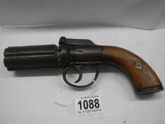 An early Victorian 'Pepper Box' pistol in need of repair.
