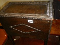An Edwardian oak sewing box with contents. COLLECT ONLY.