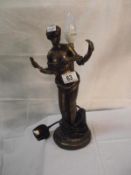 An art deco style bronzed resin figurine table lamp missing shade