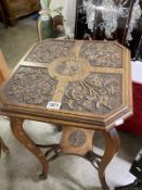 A good carved oak occasional table