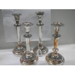 Two good pairs of Sheffield plate candlesticks.