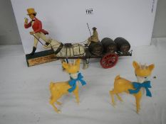Four brewery collectables including Johnny Walker figure, Whitbread dray and two Babycham bambi's.