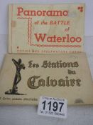 A booklet of Battle of Waterloo postcards and one other.