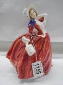 A Royal Doulton figurine - Autumn Breezes HN1934.