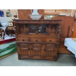 A 1930's oak buffet with lead glazed doors, COLLECT ONLY.