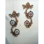 Pair of brass ormalu wall hangings with floral porcelain panels - Collect only