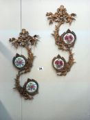 Pair of brass ormalu wall hangings with floral porcelain panels - Collect only