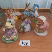 A quantity of Beswick and Royal Albert Beatrix Potter figurines