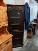 An oak corner cupboard. COLLECT ONLY.
