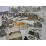 A mixed lot of old postcards.