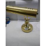 A brass banker's lamp.