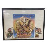 A framed Mel Brooks Blazing Saddles film poster (frame size 82cm h 107cm w)