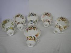 Six Royal Albert Woodland series tea cups and saucers.