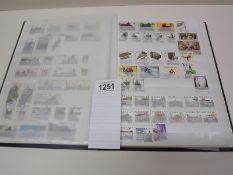 Several complete pages of stamps from around the world.