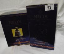 2 Boxed Bells whisky decanter H.M. The Queen 50th year of reign and Prince of Wales 50th birthday
