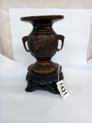 A Chinese bronze vase with makers mark to base. 12.5 cm tall.