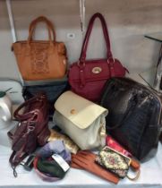 A quantity of ladies handbags, gloves & umbrellas etc. COLLECT ONLY