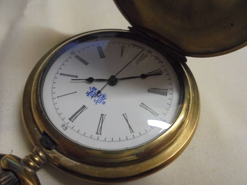 An ornate enamelled full hunter pocket watch in working order. - Image 5 of 10