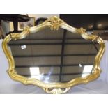 An ornate gilt ormalu framed mirror COLLECT ONLY