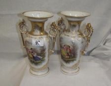 A pair of 19c continental porcelain vases with hand painted panels