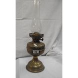 A brass oil lamp COLLECT ONLY