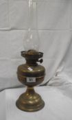 A brass oil lamp COLLECT ONLY