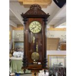 A Victorian mahogany Vienna double weight wall clock