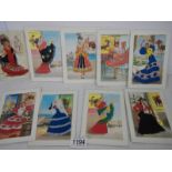 Nine embroidered cards of Spanish ladies.