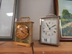 A Swiza small onyx carriage clock & a silvered metamec electric carriage mantle clock COLLECT ONLY