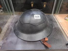 A WW2 metal helmet