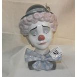 A Lladro bust of a sad clown