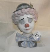 A Lladro bust of a sad clown