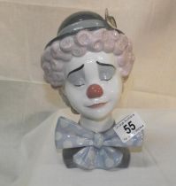 A Lladro bust of a sad clown
