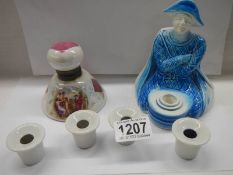 Two porcelain inkwells and four white inkwells.