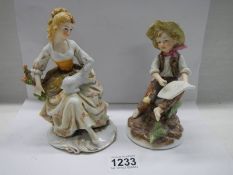 Two porcelain figures.