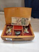 A wooden jewellery box and contents including cufflinks