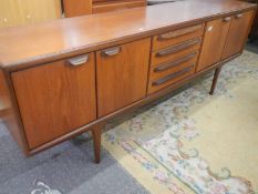 A teak sideboard with centre drawers, COLLECT ONLY.