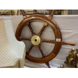 A mahogany ships / boat wheel with brass hub