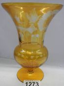 A good quality engraved amber glass vase.