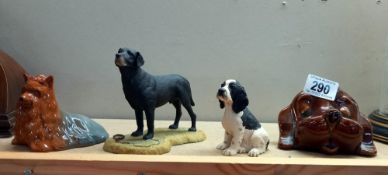 4 dog figures