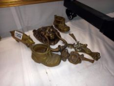 A good collection of brassware items including large Lion header knocker, Antelope knocker and Imp