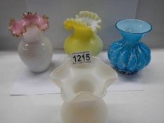 Four good early 20th century glass vases.