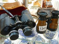 Two pairs of binoculars.