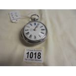 A silver pair-cased Verge, Springall, Norwich, No.21571 key wind pocket watch. cracked dial, not