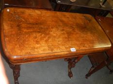 A Victorian inlaid fold over card table on carved base, COLLECT ONLY.