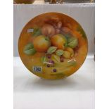A fine Caverswall hand painted fruit study by Keith Hancock on shallow bowl